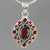 Hessonite Garnet 8 ct Faceted Oval with 12 Side Stones Sterling Silver Pendant