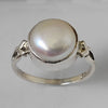 Pearl astrological ring with V shank