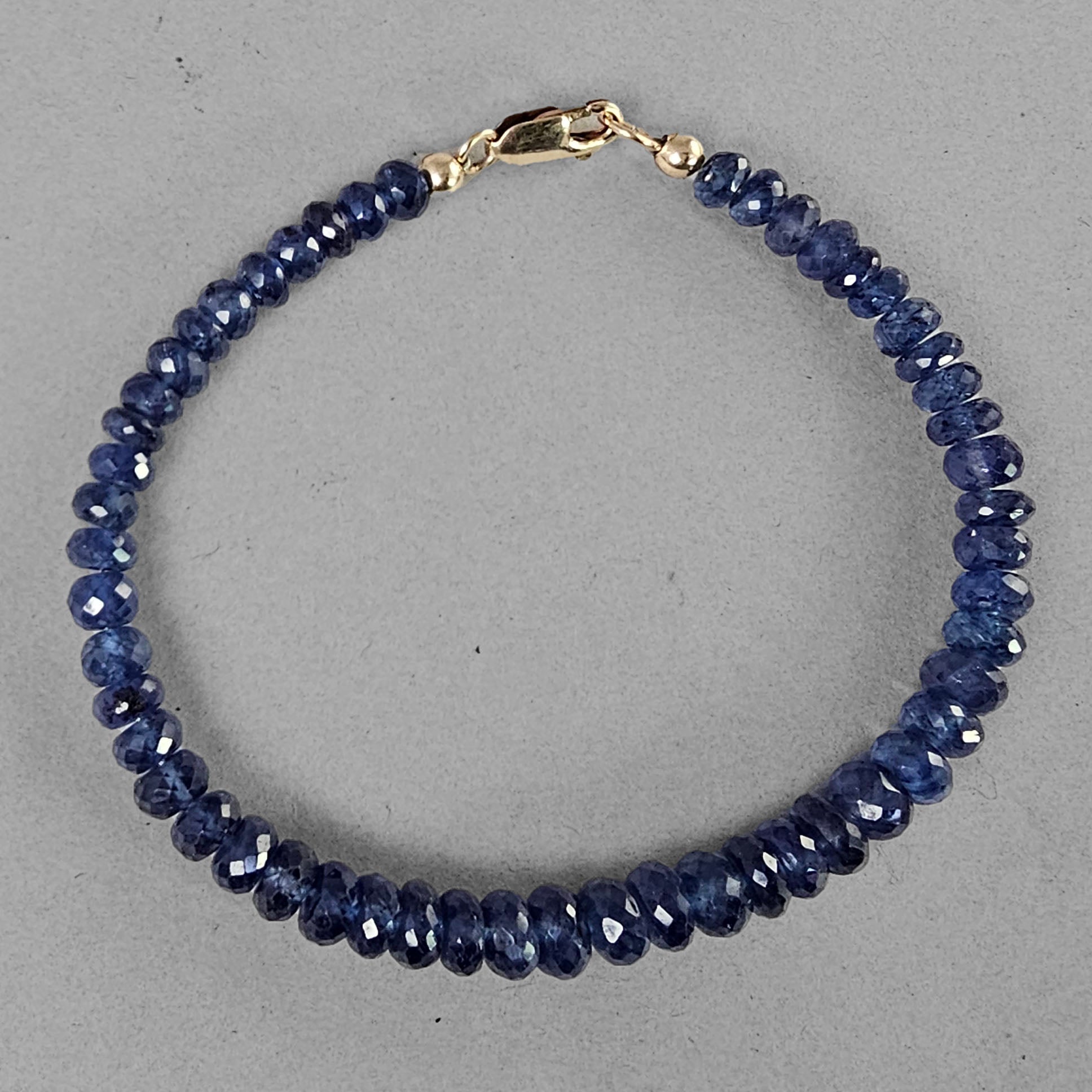 Blue Sapphire Faceted Rondelle Bracelet - 70 CTW
