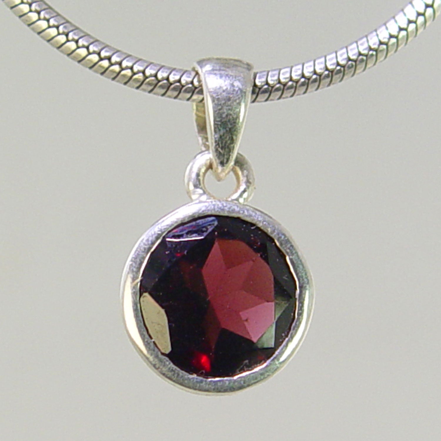 Garnet 4.5 ct Faceted Round Bezel Set Sterling Silver Pendant