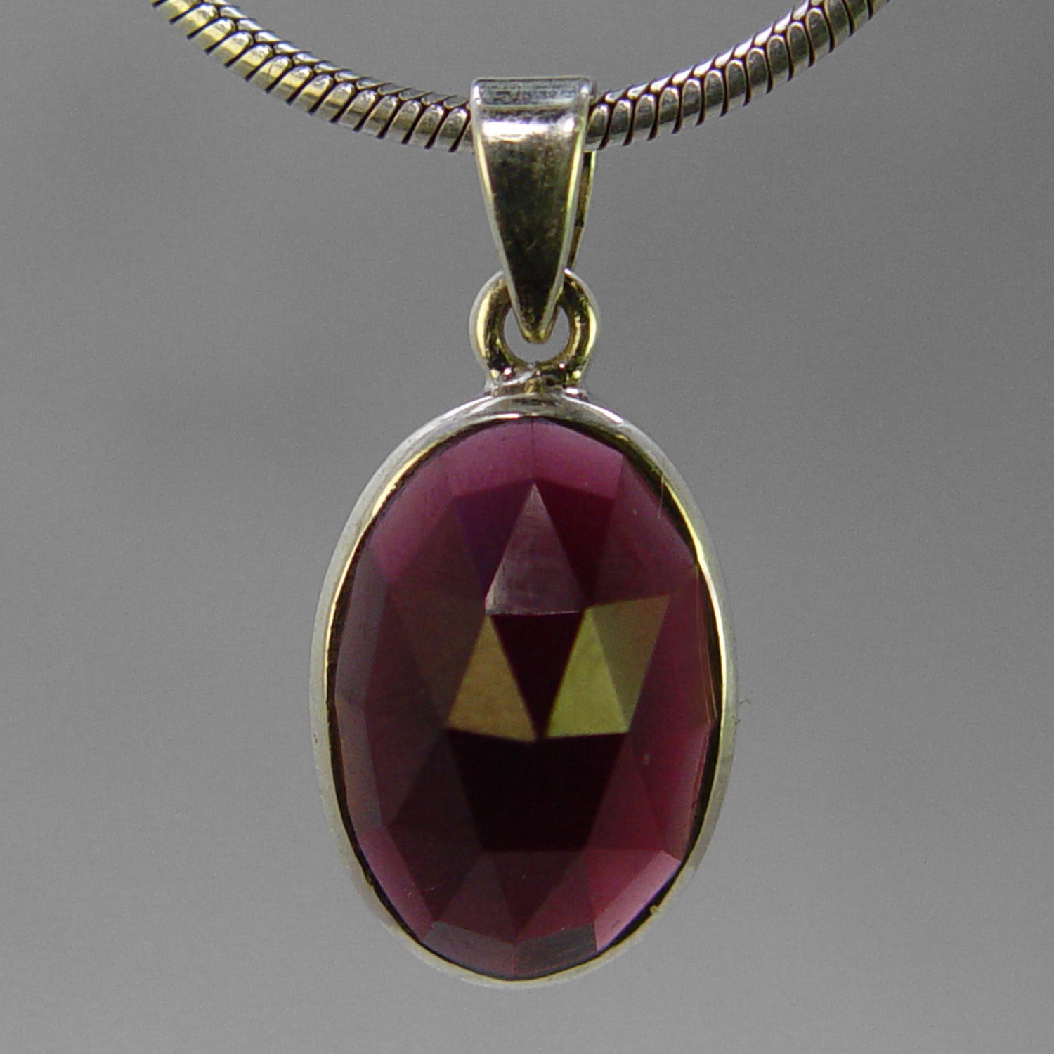 Garnet 8.0 ct Faceted Oval Sterling Silver Pendant