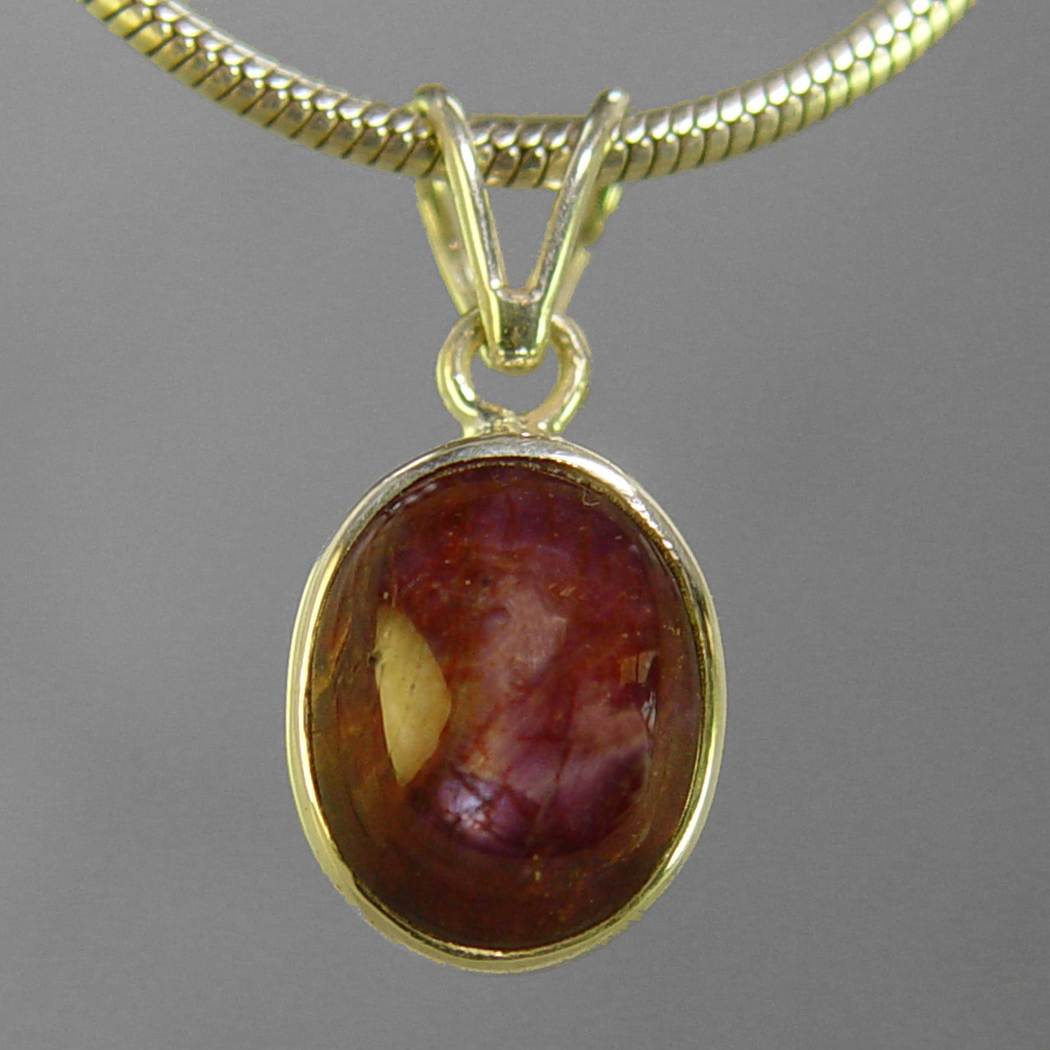 Star Ruby 12.1 ct Oval Cabochon Sterling Silver Pendant