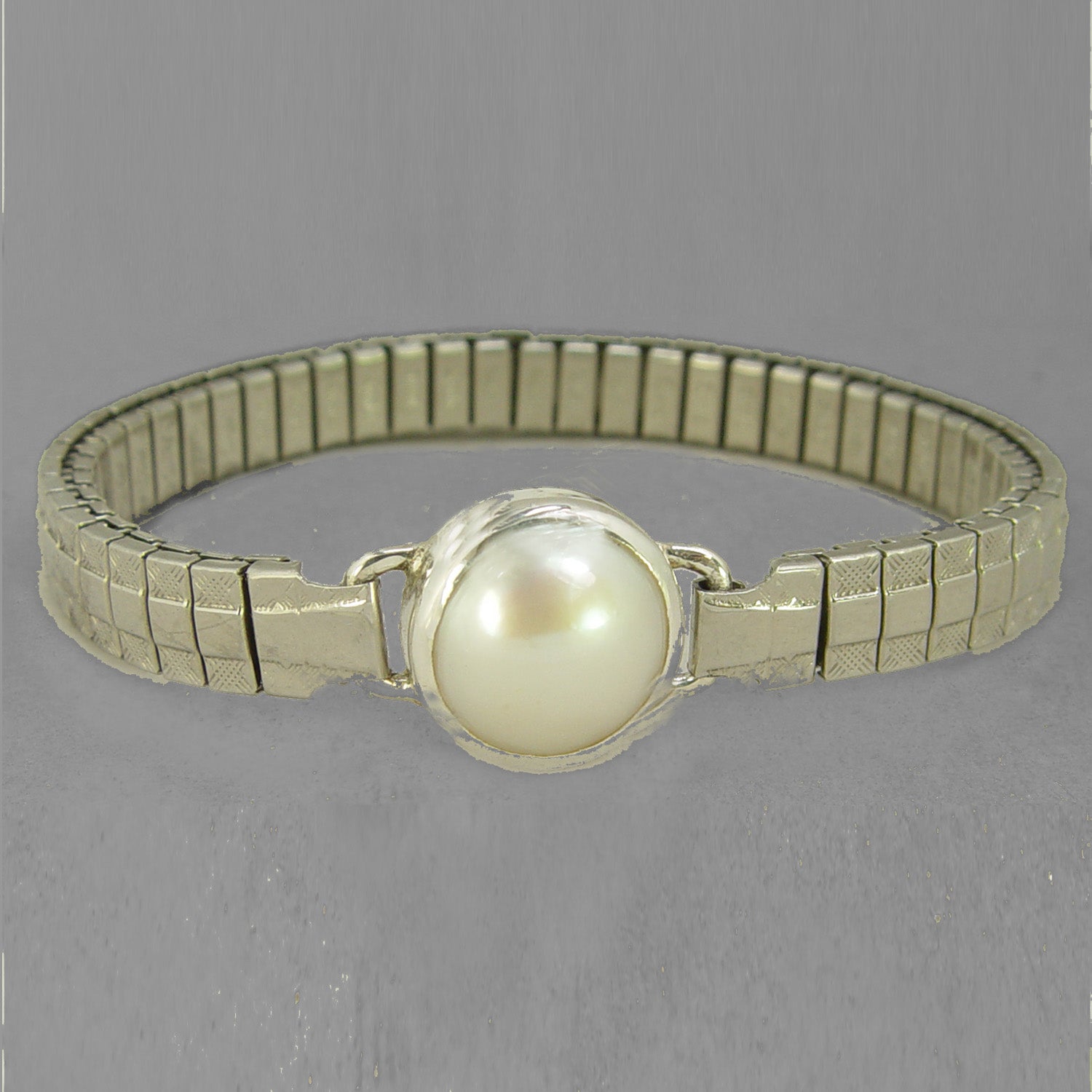 Pearl 10.6 ct set in Sterling Silver with Stainless Steel Stretch Band 7.25" Bracelet
