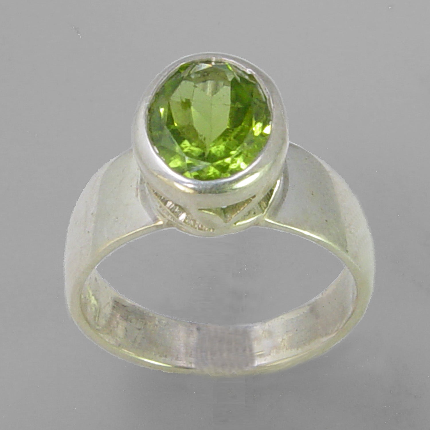 Peridot 3.0 ct Oval Fancy Bezel Set Sterling Silver Ring, Size 7