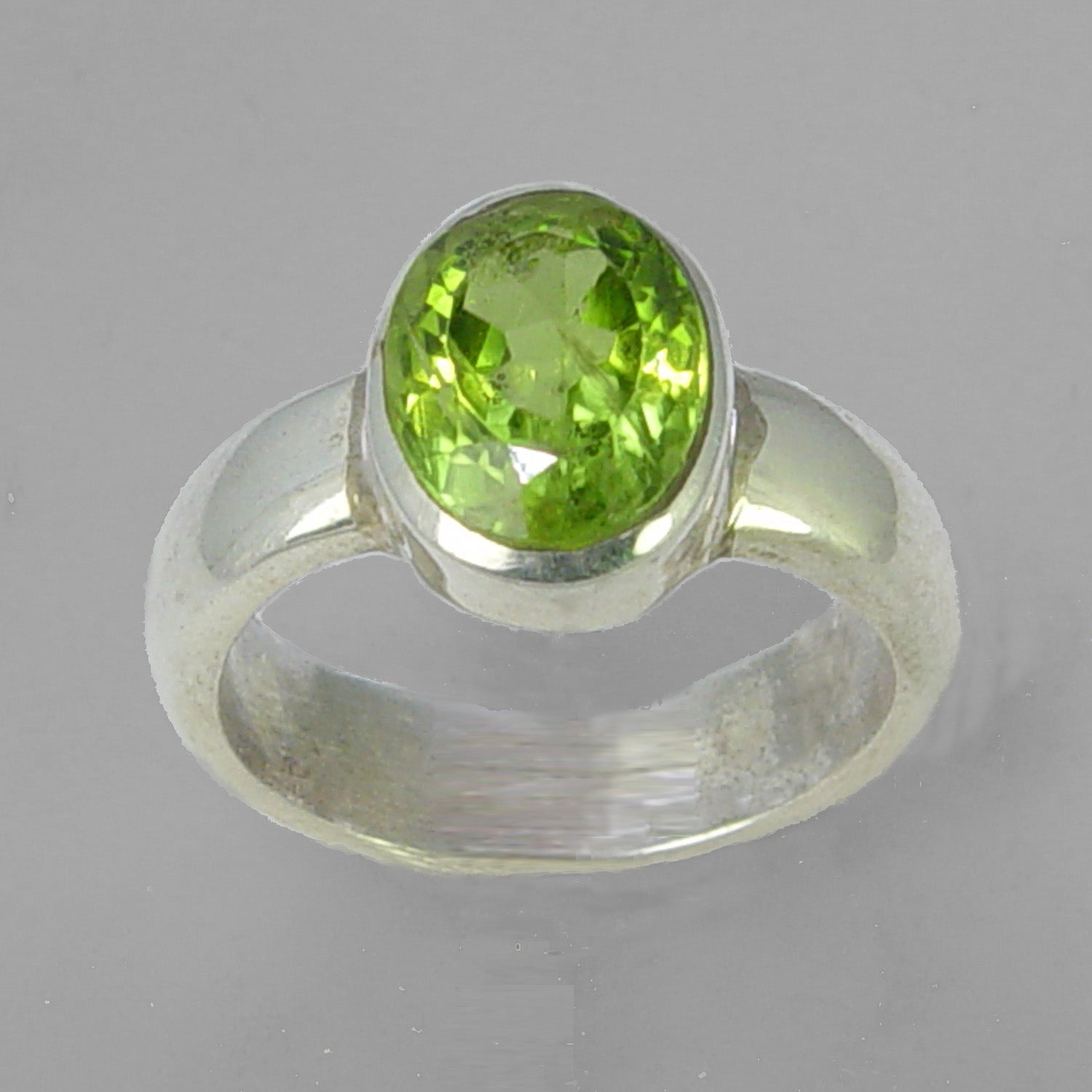 Peridot 4.1 ct Oval Bezel Set Sterling Silver Ring, Size 8.75