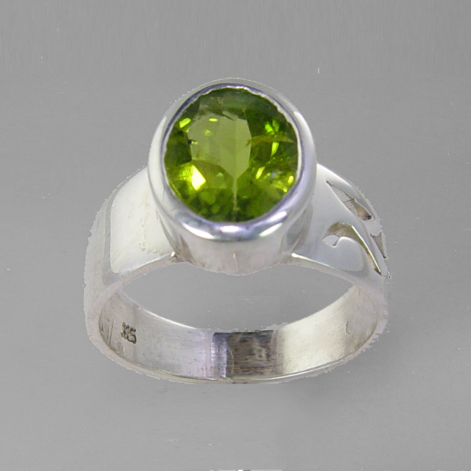 Peridot 4.5 ct Oval Bezel Set Sterling Silver Fancy Band Ring, Size 7