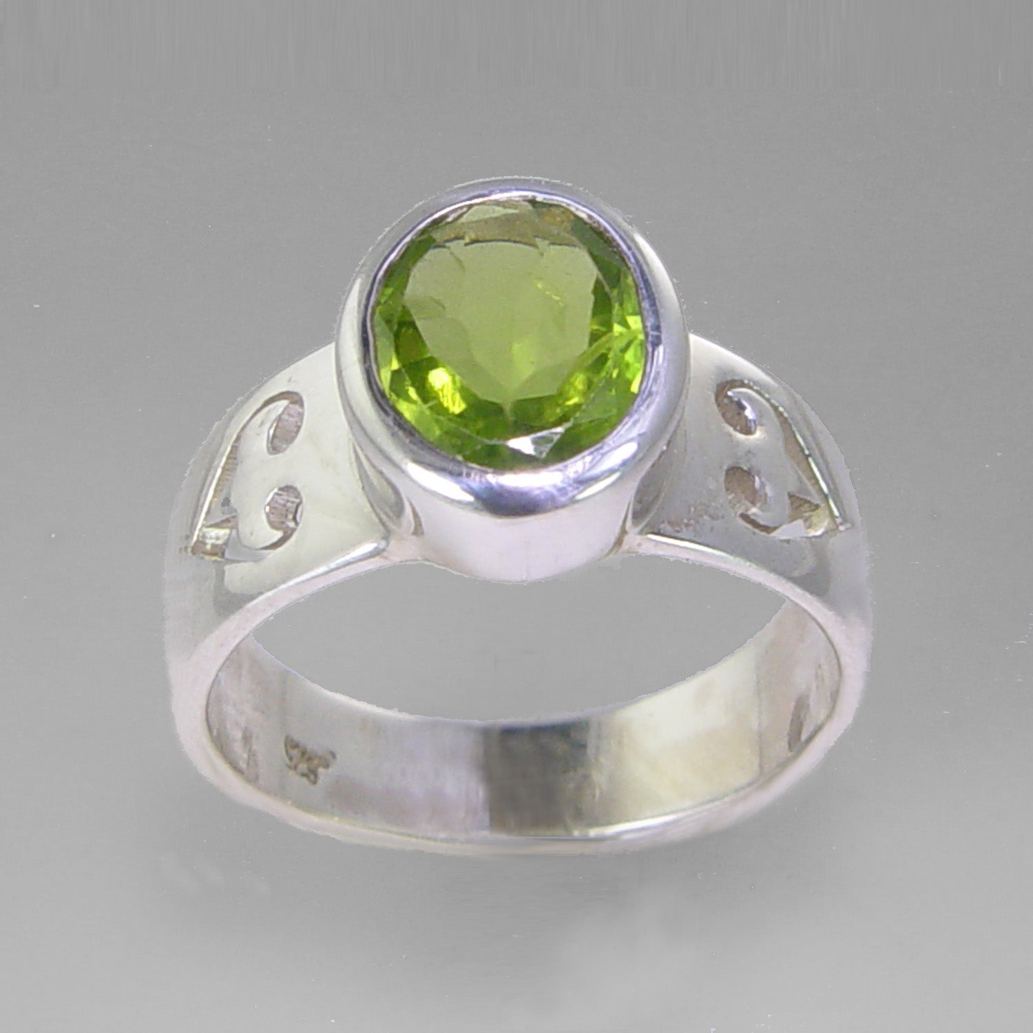 Peridot 5 ct Oval Fancy Bezel Set Sterling Silver Ring, Size 8