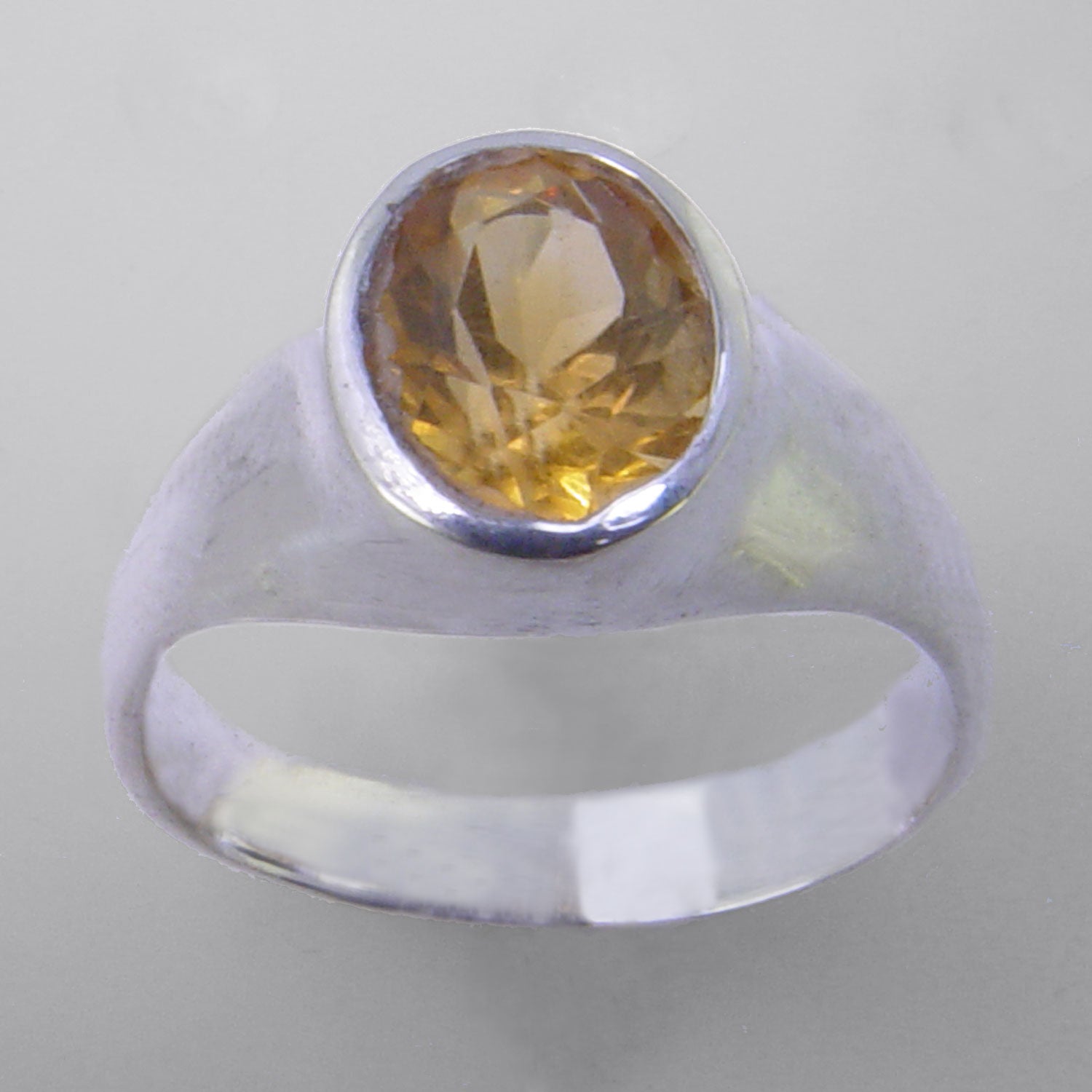 Citrine 2.5 ct Faceted Oval Bezel Set Sterling Silver Ring, Size 10