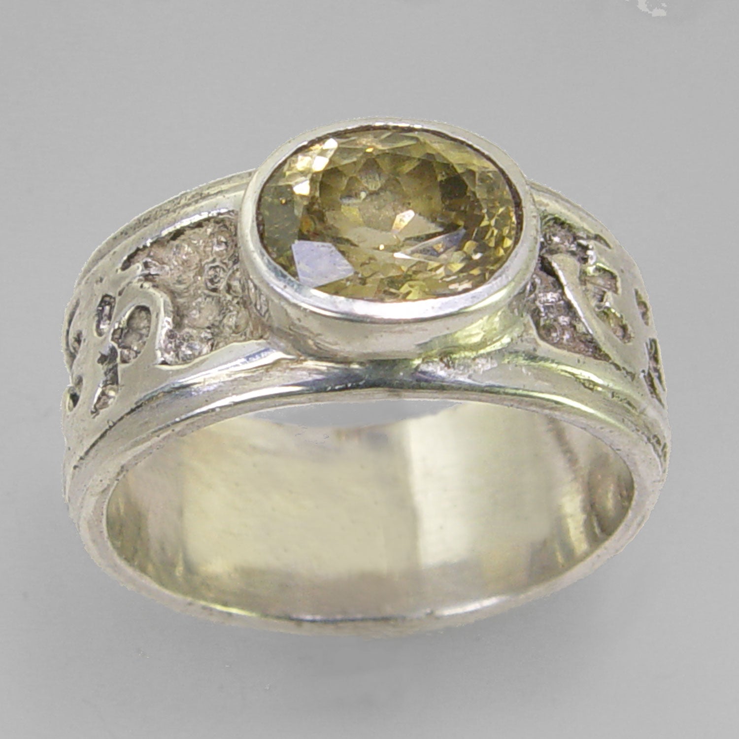 Yellow Zircon 4 ct Faceted Oval Bezel Set Sterling Silver Aum Band Ring, Size 10.5