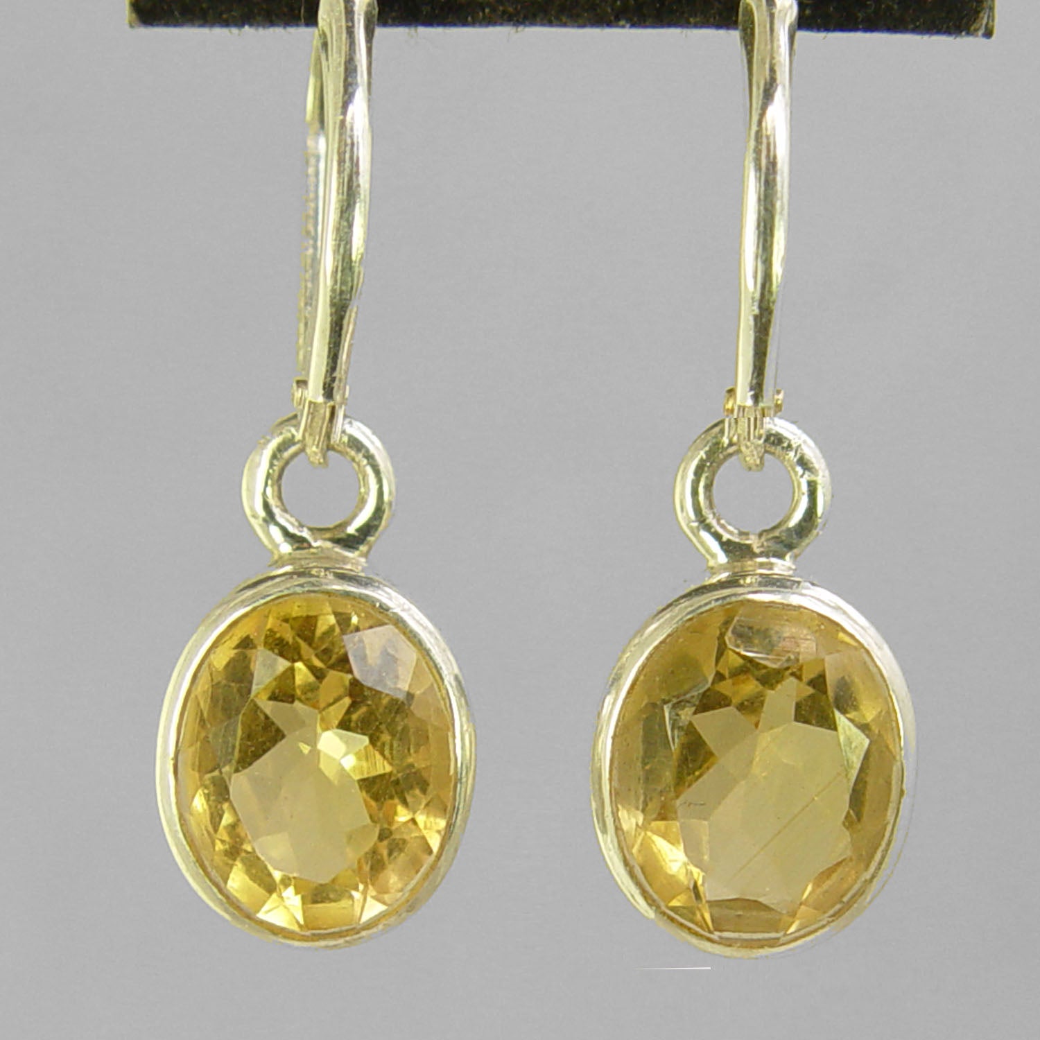 Citrine 6.5 ctw Faceted Oval Bezel Set Earrings