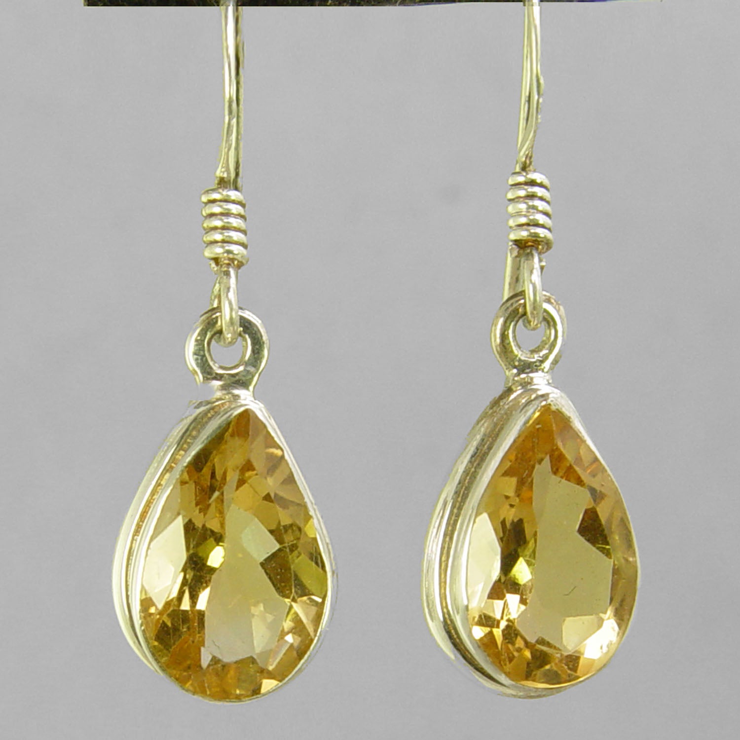 Citrine 7 ctw Faceted Pear Shape Bezel Set Earrings