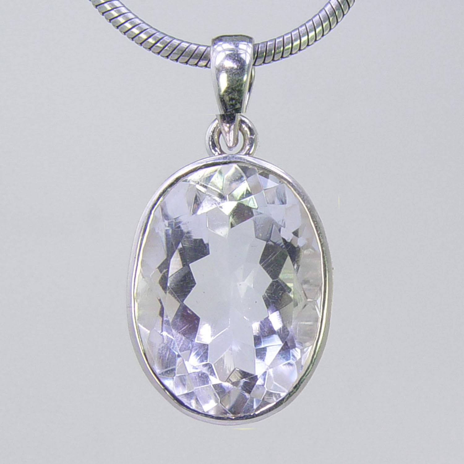 Crystal Quartz  17 ct Faceted Oval Sterling Silver Bezel Pendant