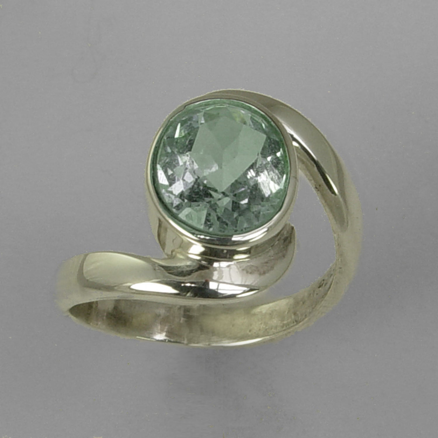Aquamarine 3 ct Oval Bezel Set Sterling Silver Swirl Shank Ring, Size 8