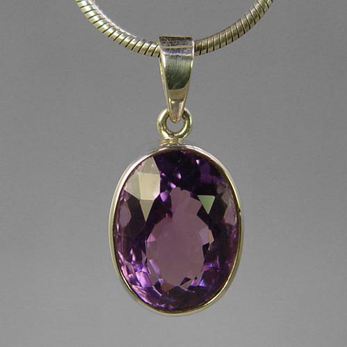 Amethyst 13 ct Faceted Oval Bezel Set Sterling Silver Pendant