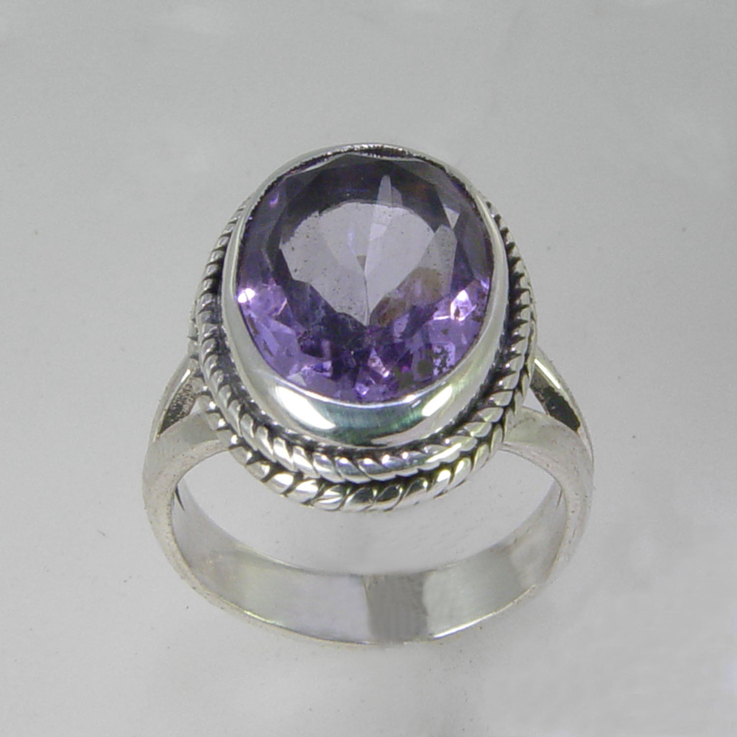 Amethyst 5.5 ct Oval Bezel Set Sterling Silver Split Shank Ring, Size 5