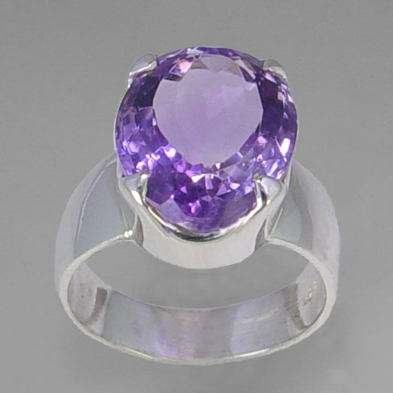 Amethyst 7 ct Faceted Oval Sterling Silver Ring, Size 7