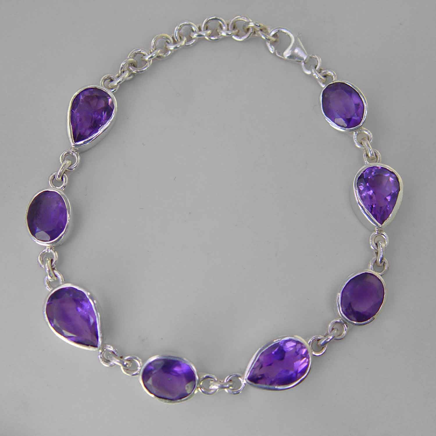 Amethyst Faceted Pear and Oval Bezel Set Sterling Silver Link Bracelet - 19 CTW