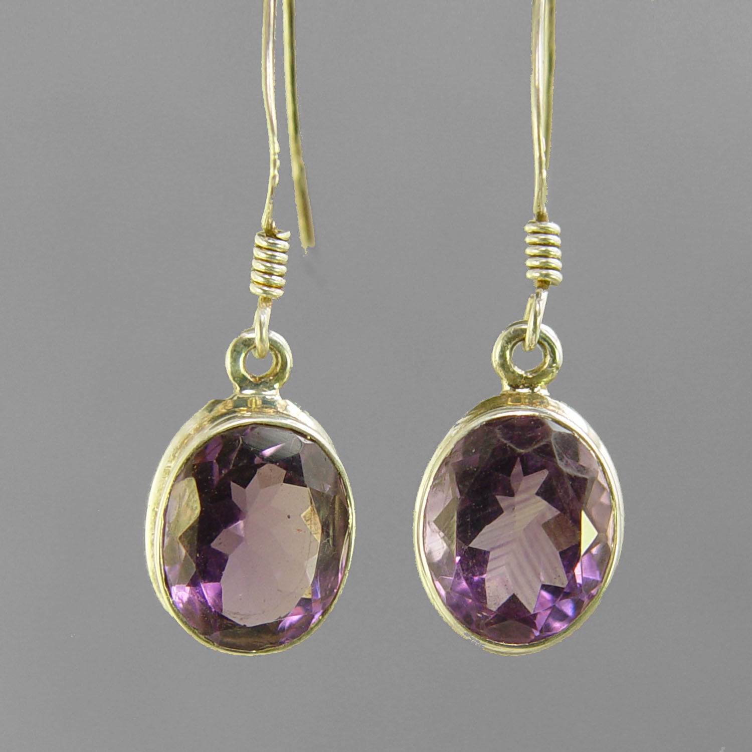 Amethyst Faceted Oval Bezel Set Sterling Silver Earrings - 7 CTW