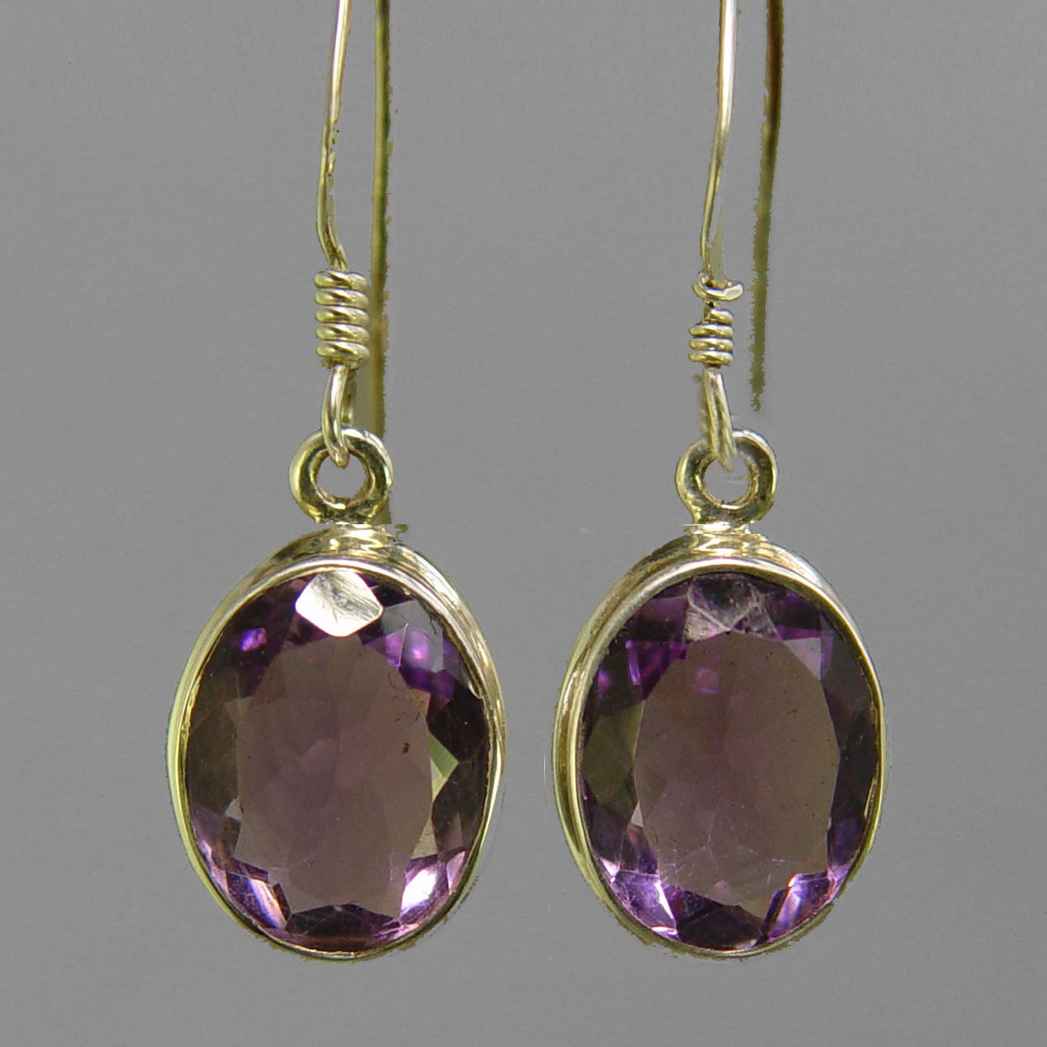 Amethyst Faceted Oval Bezel Set Sterling Silver Earrings - 9 CTW