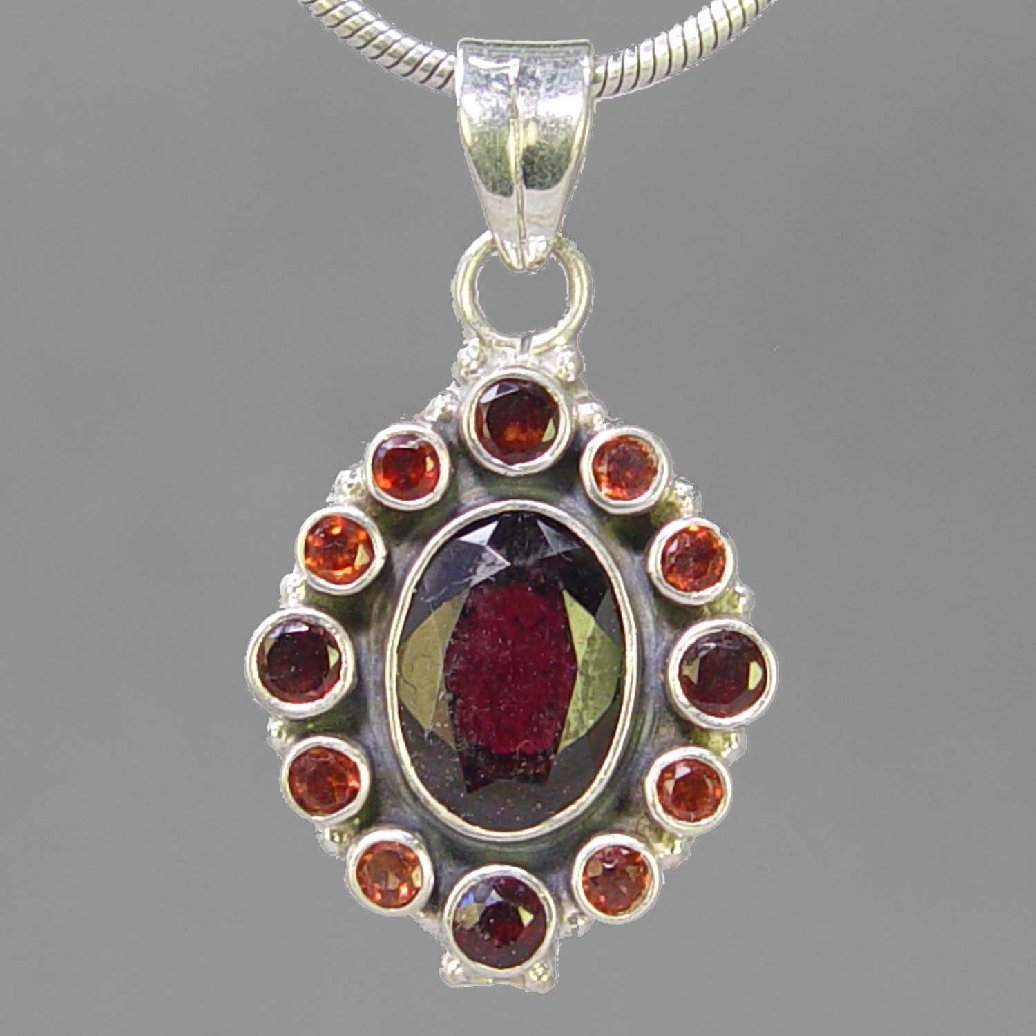 Hessonite Garnet 8 ct Faceted Oval with 12 Side Stones Sterling Silver Pendant