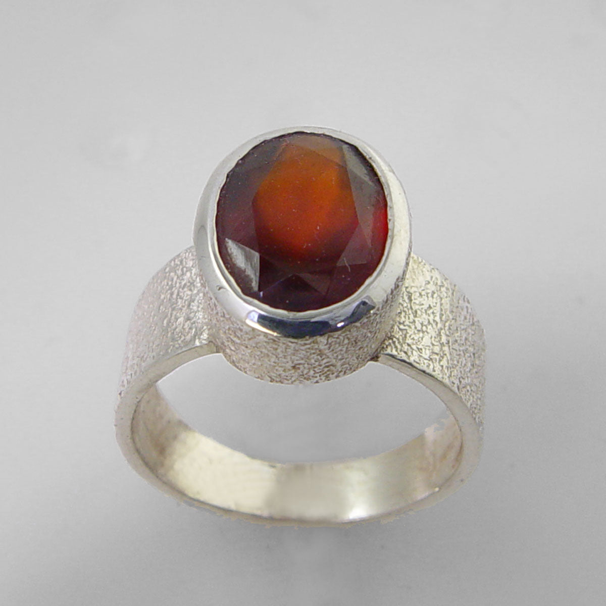 Cinnamon Hessonite Garnet 6.3 ct Faceted Oval Sterling Silver Ring, Size 8